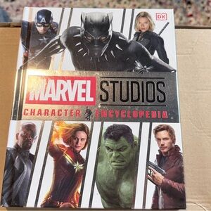 Marvel Studios Character Guide with Red and Black Cover